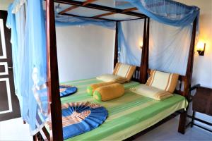 Letto o letti in una camera di Main Reef Guest House