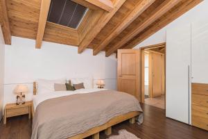 Postel nebo postele na pokoji v ubytování Chalet Monte Cristo