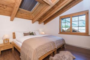 Postel nebo postele na pokoji v ubytování Chalet Monte Cristo