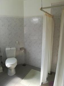 Koupelna v ubytování Ayubowan Guesthouse + 12 fotografií