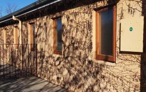 a building with vines on the side of it at Fechner Place Barossa, 1 Bed, 1 Bath & Wine in Tanunda