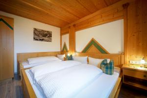 Postel nebo postele na pokoji v ubytování Fernerblick Apartments