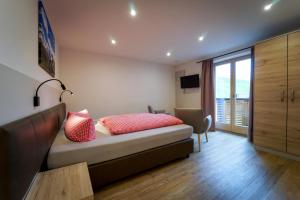 Postel nebo postele na pokoji v ubytování Fernerblick Apartments