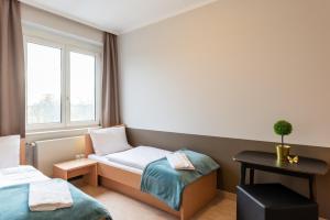 Postel nebo postele na pokoji v ubytování campus Horn + 31 fotografií