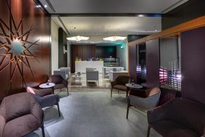 Area soggiorno di The Act Hotel Sharjah