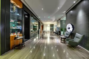 Area soggiorno di The Act Hotel Sharjah