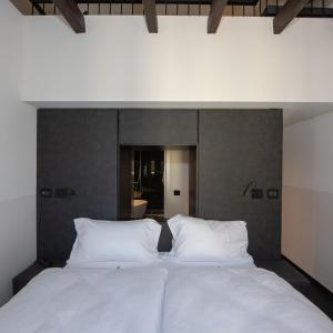 Hotel Gabbani 객실 침대