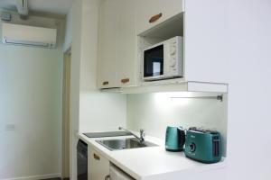 Kuchyň nebo kuchyňský kout v ubytování Love Apartment Rovinj