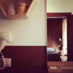 Postel nebo postele na pokoji v ubytování Hotel Monte Mazzoccone