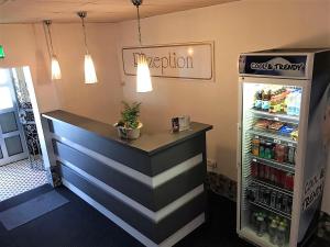 a bar in a store with a refrigerator at Casino Hotel Hamm in Hamm