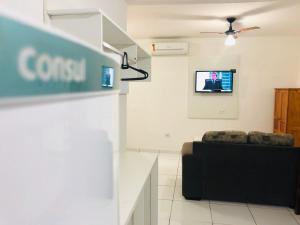 TV a/nebo společenská místnost v ubytování Pousada Mar Azul