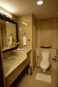 Ein Badezimmer in der Unterkunft Oxygen Resorts, Alleppey