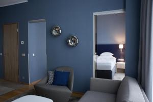 Rúm í herbergi á Tallink Spa & Conference Hotel