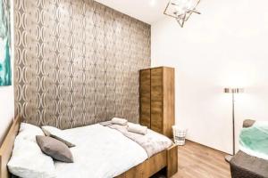 Posteľ alebo postele v izbe v ubytovaní Amazon Apartment near the famous party Boulevard
