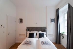 Łóżko lub łóżka w pokoju w obiekcie easy flat Sankt Elisabeth