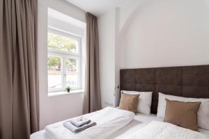 Łóżko lub łóżka w pokoju w obiekcie easy flat Sankt Elisabeth