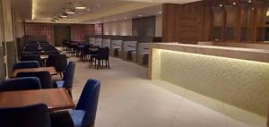Cosmique Clarks Inn Suites Goa的休息区
