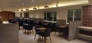 Cosmique Clarks Inn Suites Goa的休息区