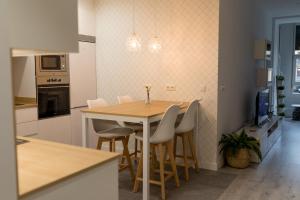 A kitchen or kitchenette at Belgrano Beach & Oldtown by Beauty Rentals