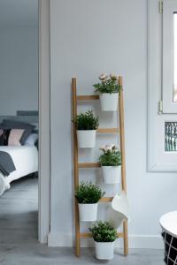 A bed or beds in a room at Belgrano Beach & Oldtown by Beauty Rentals