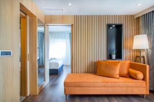 Postel nebo postele na pokoji v ubytování Signature Hotels