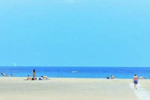 Ein Strand an oder in der Nähe des Ferienhauses