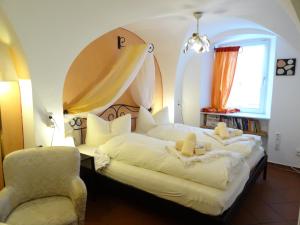 Un pat sau paturi într-o cameră la Gutsherrenstube