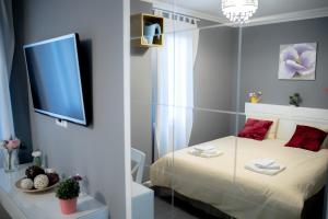 Katil atau katil-katil dalam bilik di Sun Residences Intercontinental