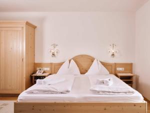 Postelja oz. postelje v sobi nastanitve Hotel Blattlhof