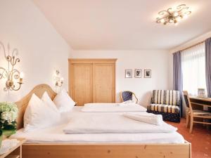 Postelja oz. postelje v sobi nastanitve Hotel Blattlhof