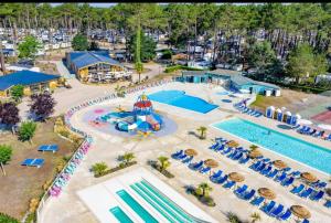 an aerial view of a pool at a resort at Camping les dunes de contis in Saint-Julien-en-Born +7 photos