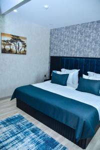 Postel nebo postele na pokoji v ubytování Supreme Hotel Baku