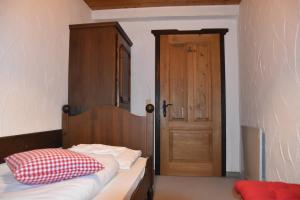 Postel nebo postele na pokoji v ubytování Apartment Julia Nassfeld