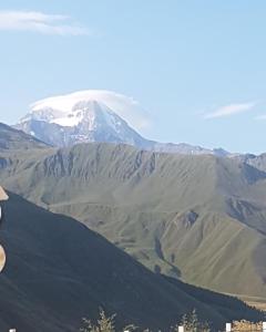 a view of a mountain with snow on it at New Gudauri Loft 2 - "Mano", near ski lift Gondola in Gudauri
