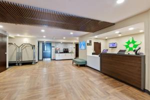 an office lobby with a cash register and a pharmacy at Extended Stay America Premier Suites - Union City - Dyer St in Union City