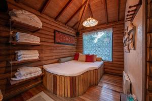 Cama ou camas em um quarto em Pousada do Engenho