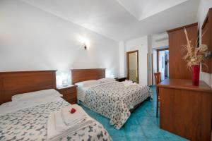 Postel nebo postele na pokoji v ubytování La Cascina - Villa Nenno