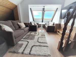 Posedenie v ubytovaní Miramar Ski a pie de pista - Ático precioso con piscina