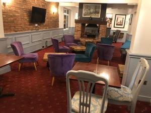 The lounge or bar area at The Cedars Hotel, Loughborough 