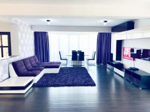 Khu vực ghế ngồi tại Luxury 3 Bedroom Pool Villa
