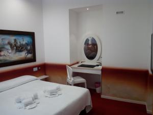 TV a/nebo společenská místnost v ubytování San Giorgio Modica Hotel