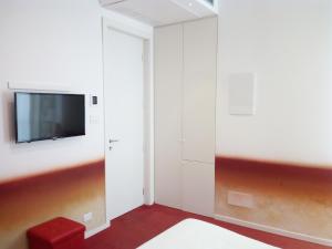 TV a/nebo společenská místnost v ubytování San Giorgio Modica Hotel