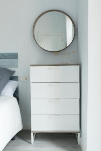 A bed or beds in a room at Belgrano Beach & Oldtown by Beauty Rentals