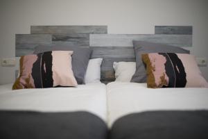 A bed or beds in a room at Belgrano Beach & Oldtown by Beauty Rentals