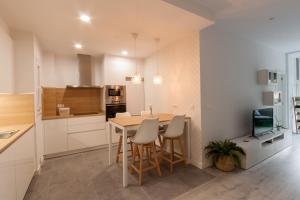 A kitchen or kitchenette at Belgrano Beach & Oldtown by Beauty Rentals