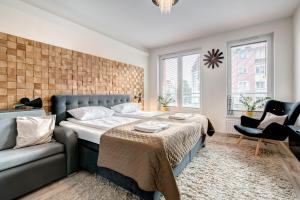 Posteľ alebo postele v izbe v ubytovaní Live & Travel Old Town Apartments