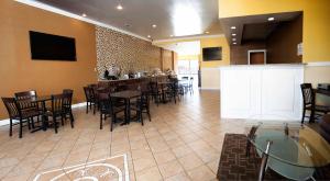 A restaurant or other place to eat at Express Inn & Suites