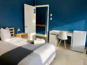 Krevet ili kreveti u jedinici u okviru objekta Bleu Mer, hôtel & résidences