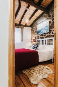 En eller flere senge i et værelse på Casa Oeste