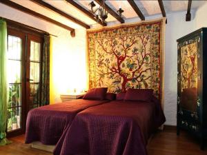 Ένα ή περισσότερα κρεβάτια σε δωμάτιο στο Molino Rodete